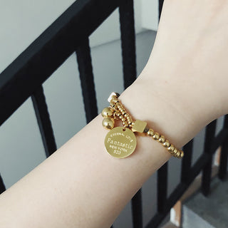 Gold coin elastic bracelet